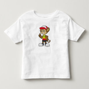 Monkey som basketspelare med basket t shirt