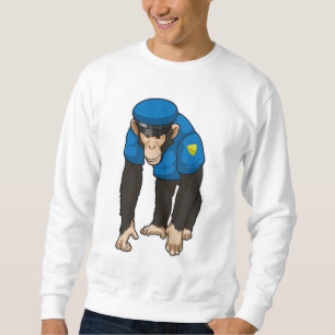 Monkey som polis med enhetlig utformning lång ärmad tröja