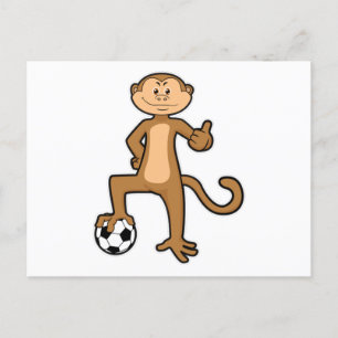 Monkey vid sport med fotbollsboll vykort