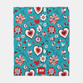 Monogram av kokvett, blommigt och hjärtstam fleecefilt