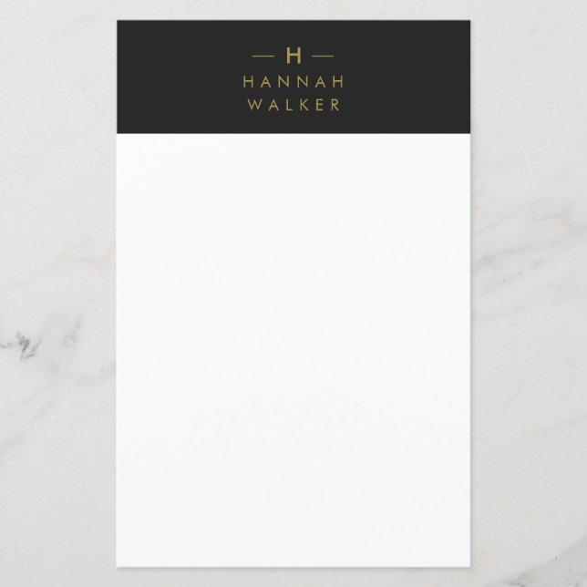 Monogram Black Guld | Modern minimalistisk station (Framsida)