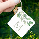 Monogram botaniskt nyckelring<br><div class="desc">Denna botaniska nyckelkedja är dekorerad med vattenfärgat löv i gröntens nyans. Enkelt anpassade. Ursprunglig vattenfärg © Michele Davies.</div>