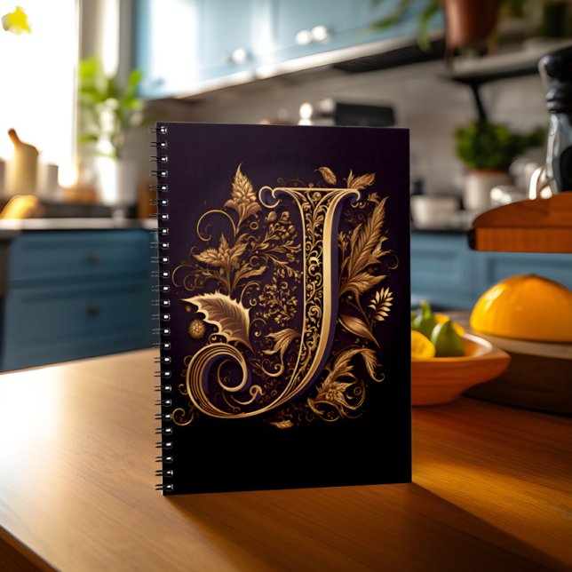 Monogram Brev J Anteckningsbok (Notebook with monogram letter J stands on kitchen table)