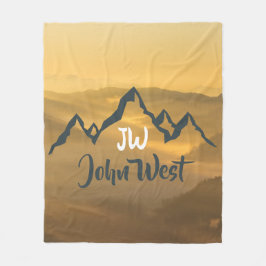 Monogram för solupphöjda bergsområden i guld fleecefilt