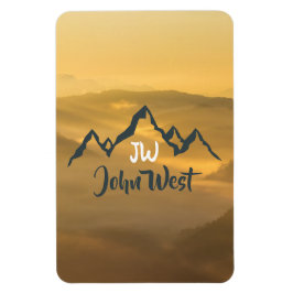 Monogram för solupphöjda bergsområden i guld magnet