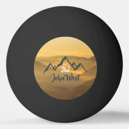 Monogram för solupphöjda bergsområden i guld pingisboll