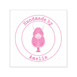 Monogram höglandskö som hanteras av självfärgande stämpel