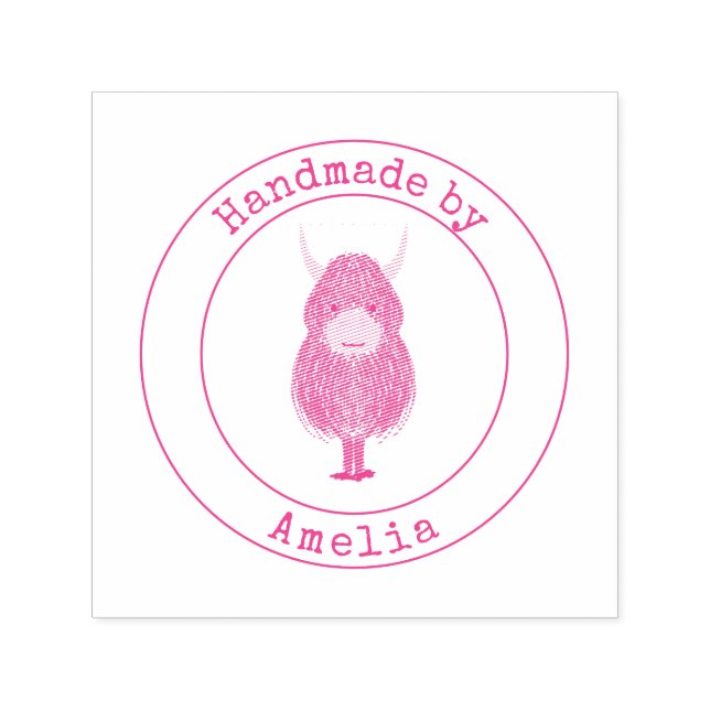 Monogram höglandskö som hanteras av självfärgande stämpel (Design)