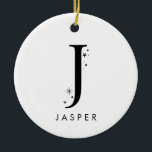 Monogram J Celestial Namn Julgransprydnad Keramik<br><div class="desc">Lägg till en gnutta celestial magi till din helgdag-décor med den här fantastiska monogramprydnaden för julprydnad! Denna personlig är en perfekt som är viktig för årstiden. Den har ett brev med små stjärnor och måne kring den och ditt val av namn under. Den passar bekvämt in i upp till 10...</div>