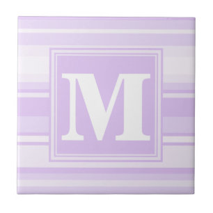Monogram lilac rand kakelplatta
