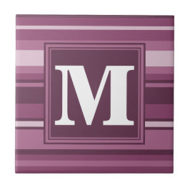 Monogram mauve rand kakelplatta