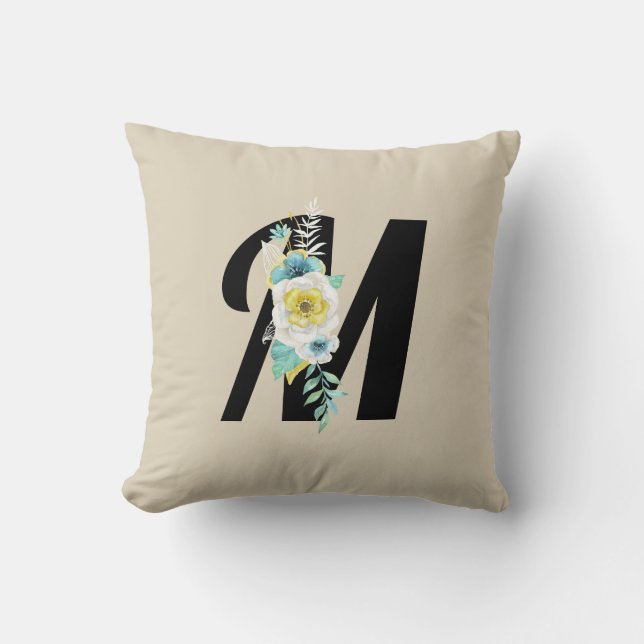 Monogram med blomsterdekoration i akvaton och vitt kudde (Framsida)
