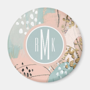 Monogram och Guld I Magnet