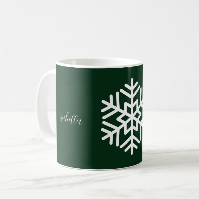 Monogram och stor vit snöflinga på skogsgrön kaffemugg (Framsida vänster)