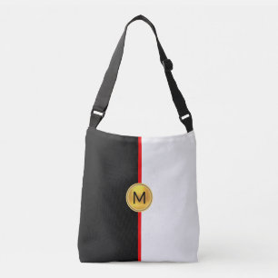 Monogram på svart och vitt med röd linje axelväska