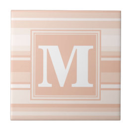 Monogram peach rand kakelplatta