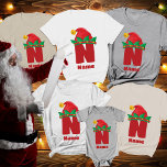 Monogram Personlig med Namn jul T Shirt<br><div class="desc">Skapa varaktiga helgdag med Monogram-Personligen med Namn-familjens T-Shirt. De här anpassningsbar julskjortorna är designade för att göra firande mer festligt och personligt. Varje skjorta har en lekfull monogram som är försedd med en julhatt, som lägger till en roligt och glad inslag till din helgdag. Perfekt för familjer, par eller grupper....</div>