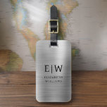 Monogram Silver Brushed Metallic Elegant Bagagebricka<br><div class="desc">Vi presenterar vårt Monogram Brushed Metallic Elegant Luggage Tag: Öka din resupplevelse med detta sofistikerade tillbehör. Den här bagagetaggen är gjord av borstat metallmaterial, och den är ett uttryck för elegans och stil. Monogramdesignen ger en personlig beröring och skapar det enkelt att identifiera ditt bagage samtidigt som du tillför en...</div>