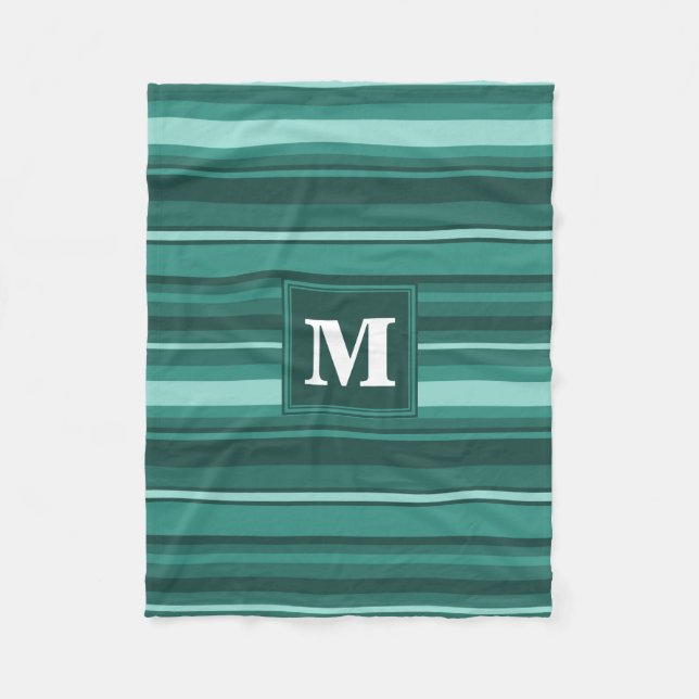 Monogram teal rand fleecefilt (Framsidan)