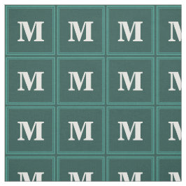 Monogram teal rand tyg