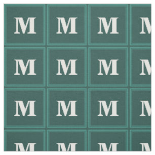 Monogram teal rand tyg