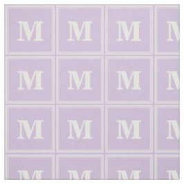 Monogram thistel lila rand tyg