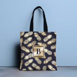 Monogram Tropical Pineapple Girly Guld Tygkasse<br><div class="desc">Den här moderna tropiska designen har ananas från guld på en marin blå bakgrund med personligens monogram i mitten. Anpassa genom att redigera texten i textrutan. #monogram #monogrammed #initial #personlig #tropiskt #pineapple #girly #feminin #frukt #guld #navy #navyblue #golden #chic snyggt #elegant #feminin #giftsforher #blue #accessoer #tote #totebag #handväskor</div>