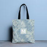 Monogram Vintage Blue-Blommönster Tygkasse<br><div class="desc">Den här designen har en blå blommigt i vintagen med personligens monogram. Anpassa genom att redigera texten i textrutan. #totes #totepåsar #säcksäckar #tillbehör #giftsforher #monogram #personalizedgifts</div>
