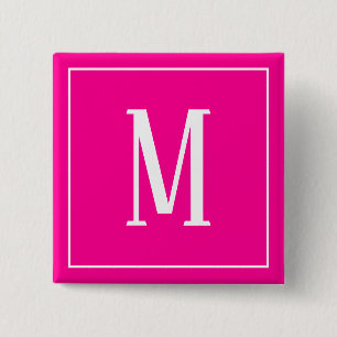 Monogram vit på het rosa fyrkantig knapp
