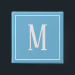 Monogram vit på ljusblå fyrkantig knapp<br><div class="desc">En fyrkantig knapp med ett vitt monogram på en ljusblå bakgrund. Anpassa knappen med din egen initial eller initialer,  färger,  med flera alternativ.</div>