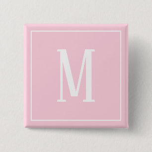 Monogram vit på ljusrosa fyrkantig knapp
