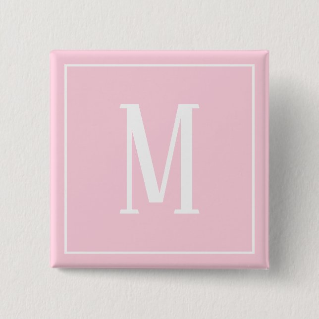 Monogram vit på ljusrosa fyrkantig knapp (Framsida)