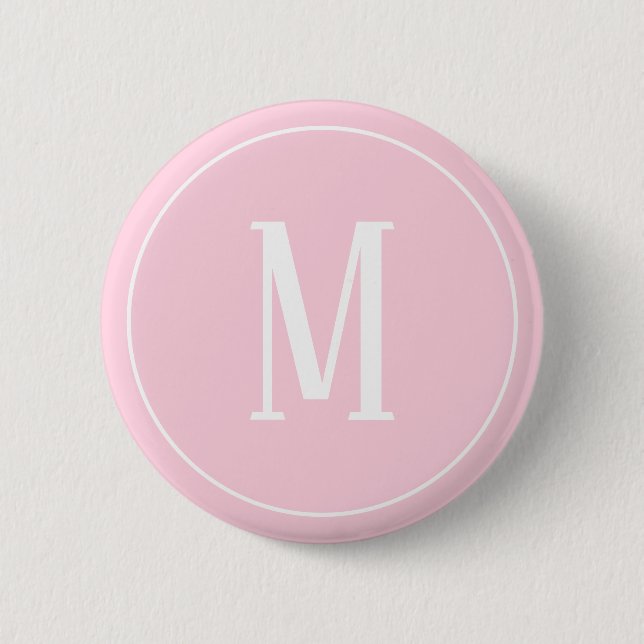 Monogram vit på ljusrosa rund knapp (Framsida)