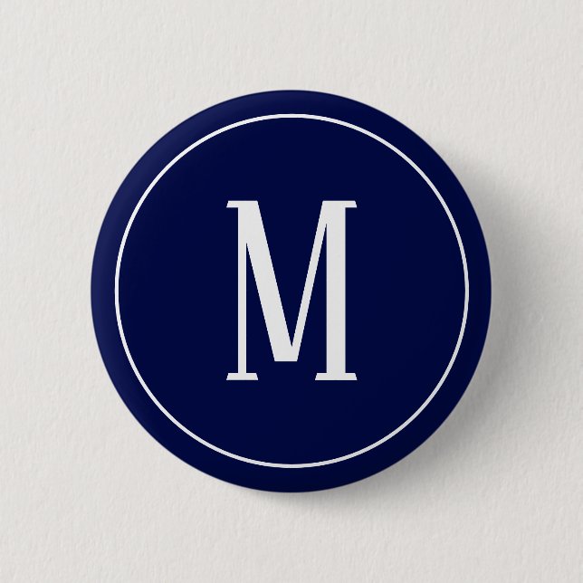 Monogram vit på marinblå rund knapp (Framsida)