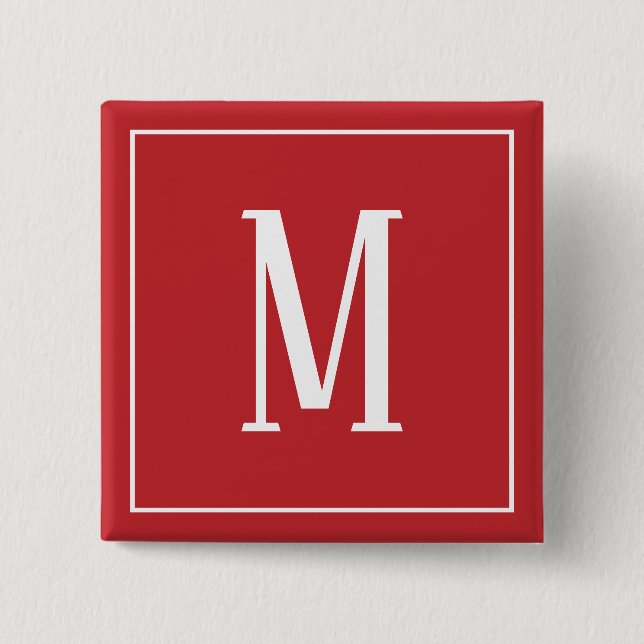 Monogram vit på mörkröd fyrkantig knapp (Framsida)