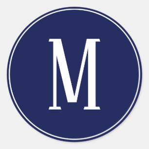 Monogram White på marinblå rund etikett