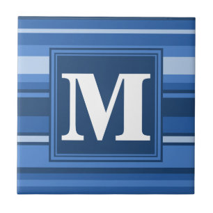 Monogramblå rand kakelplatta