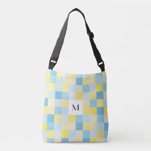 Monogramblått och gult kvadrerar kor axelväska