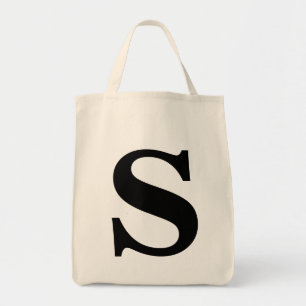 Monogramen hänger lös tygkasse