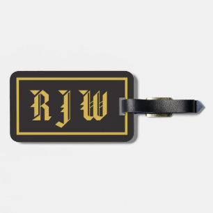 Monogramen märka med sina initialer guld på svart bagagebricka