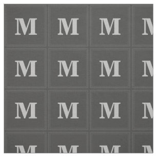 Monogramkol kvadrerar tyg
