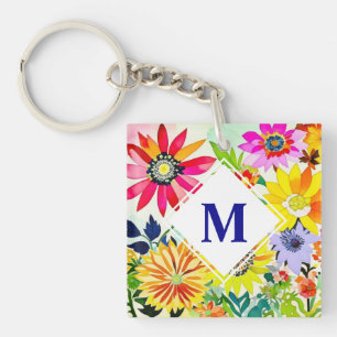 Monogrammat av vattenfärgade blommor