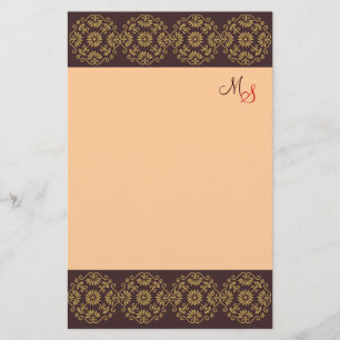 Monogrammed brevpapperguld på brunt brevpapper