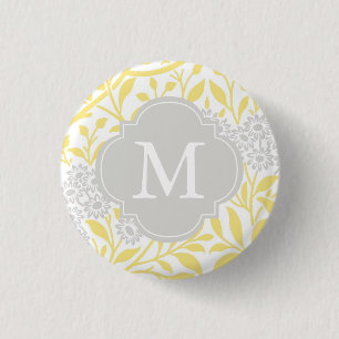 Monogrammed gultgråttblommönster knapp