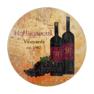 Monogrammed vinflaskor och druvor
