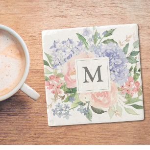 Monogrammerad akvarell blå rosa vårblomma stenunderlägg