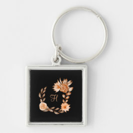 Monogrammerad svart brun och persikofärgad blommig fyrkantig silverfärgad nyckelring