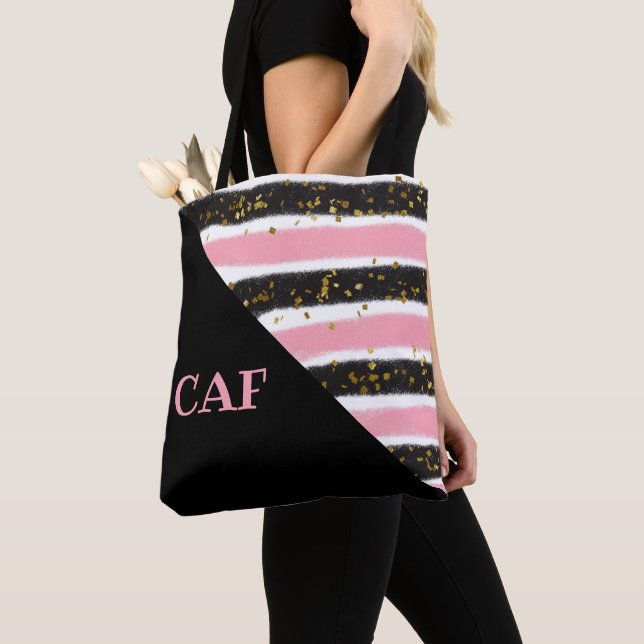 Monogrammerade rosa och svarta ränder med guldglit tygkasse (Närbild)
