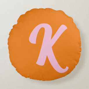 Monogramorange och rosa rund kudde