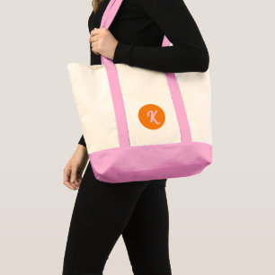Monogramorange och rosa tygkasse